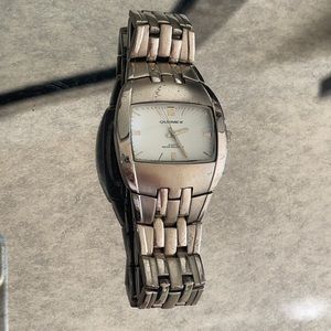 QUEMAX quarts water resistant steel on steel men’s watch
